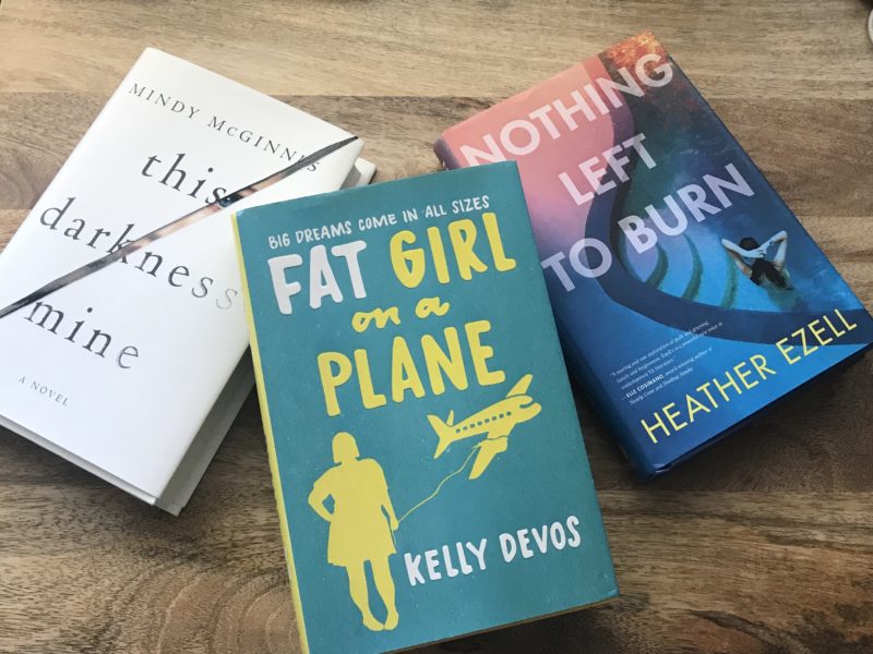 One desk three books fat book